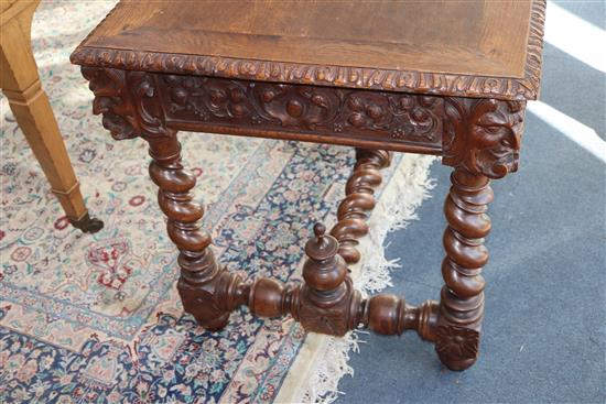 A late 19th century Flemish carved oak side table W.120cm